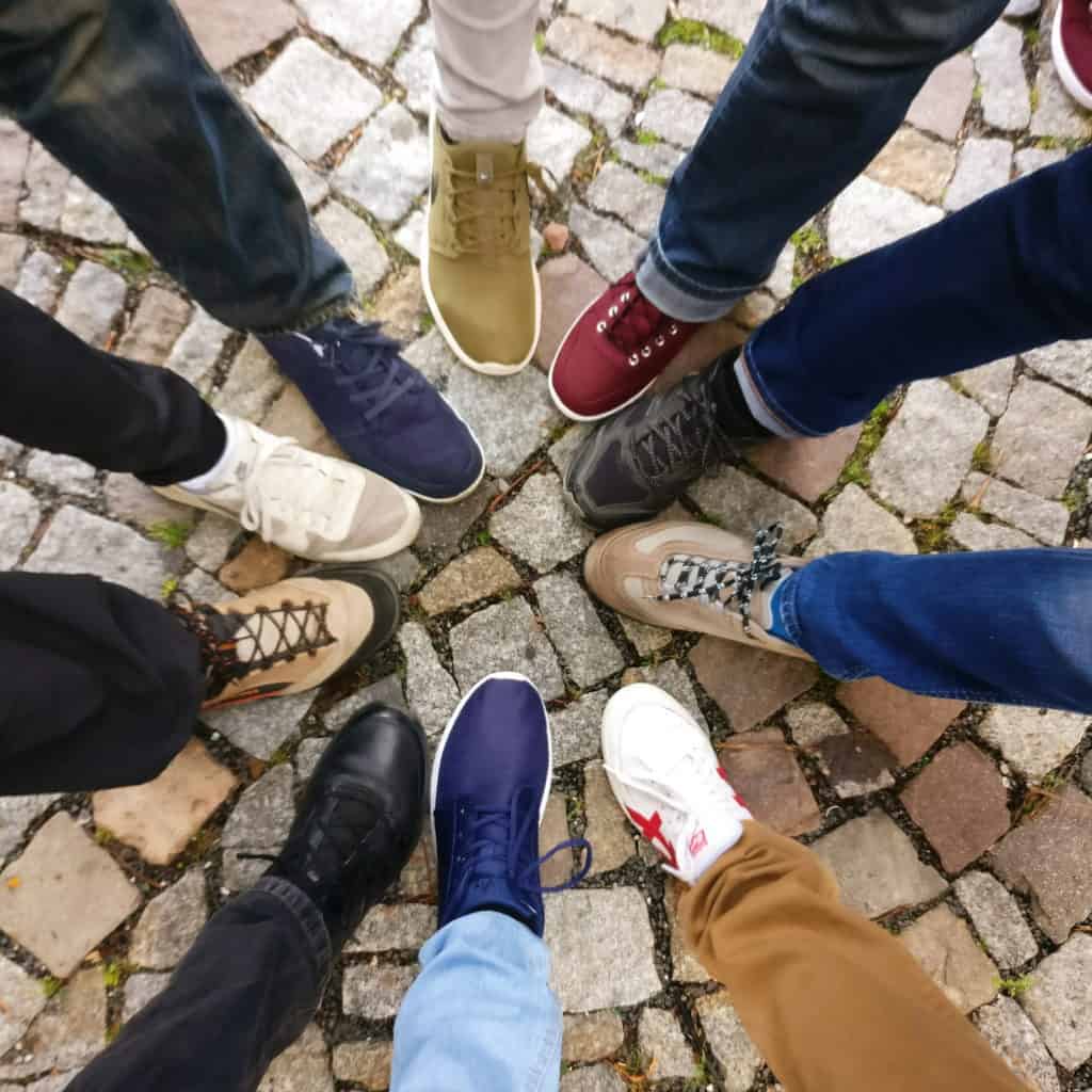 Different styles and colors of shoes representing diversity and unity among residents of Manhattan, New York