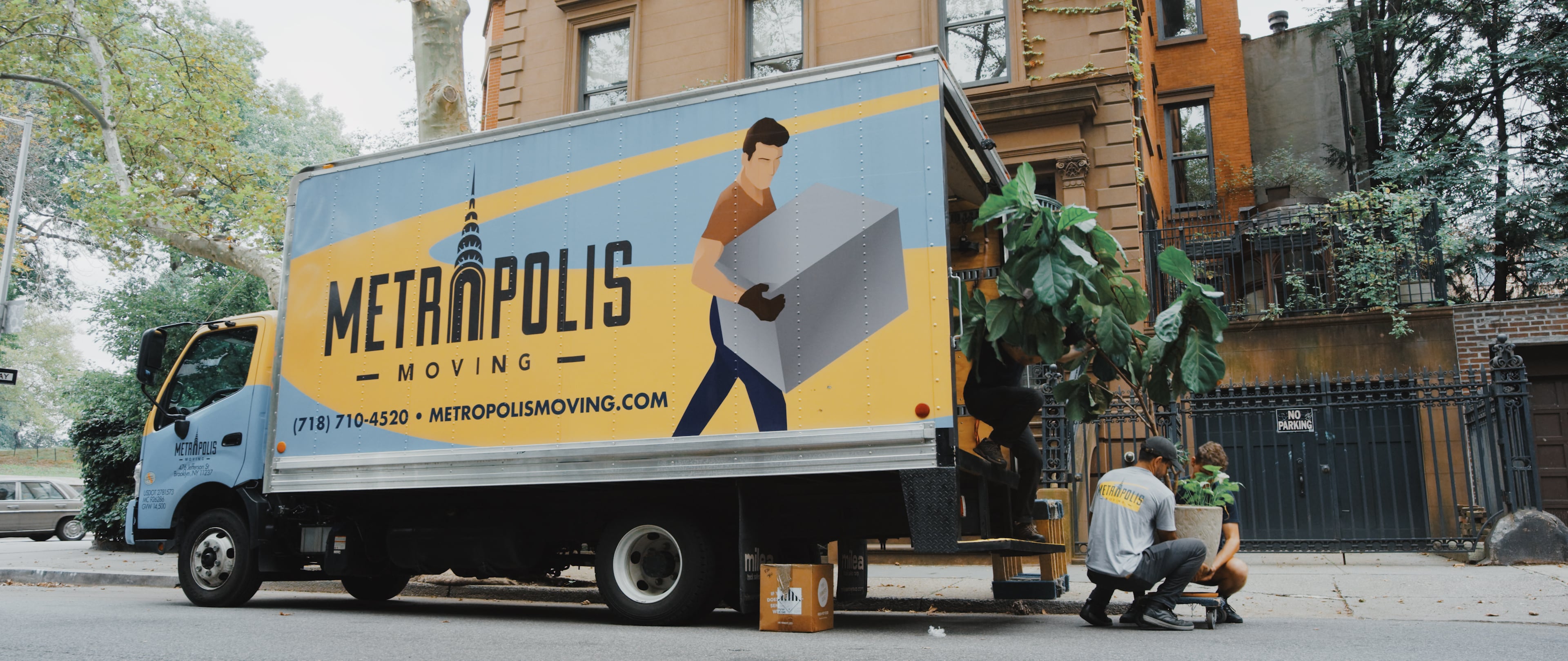 NYC movers moving across the street in traffic in Fort Green, Brooklyn