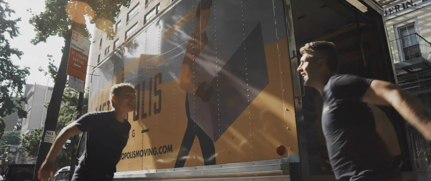 Friendly NYC movers high five