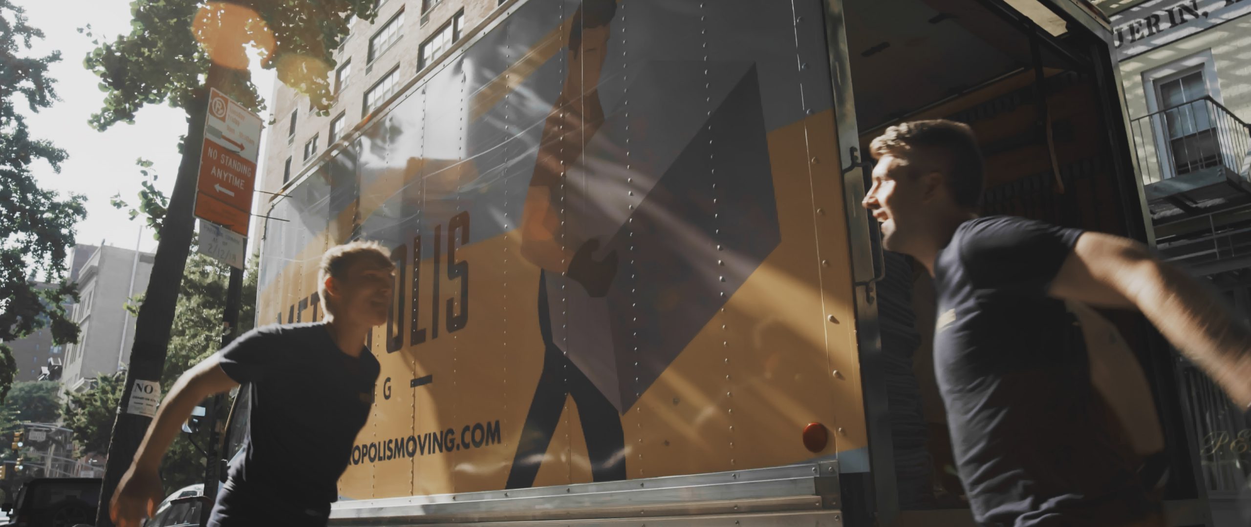 Friendly NYC movers high five