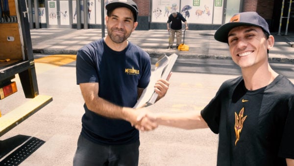 Satisfied NYC moving customer shaking hands with a mover 0