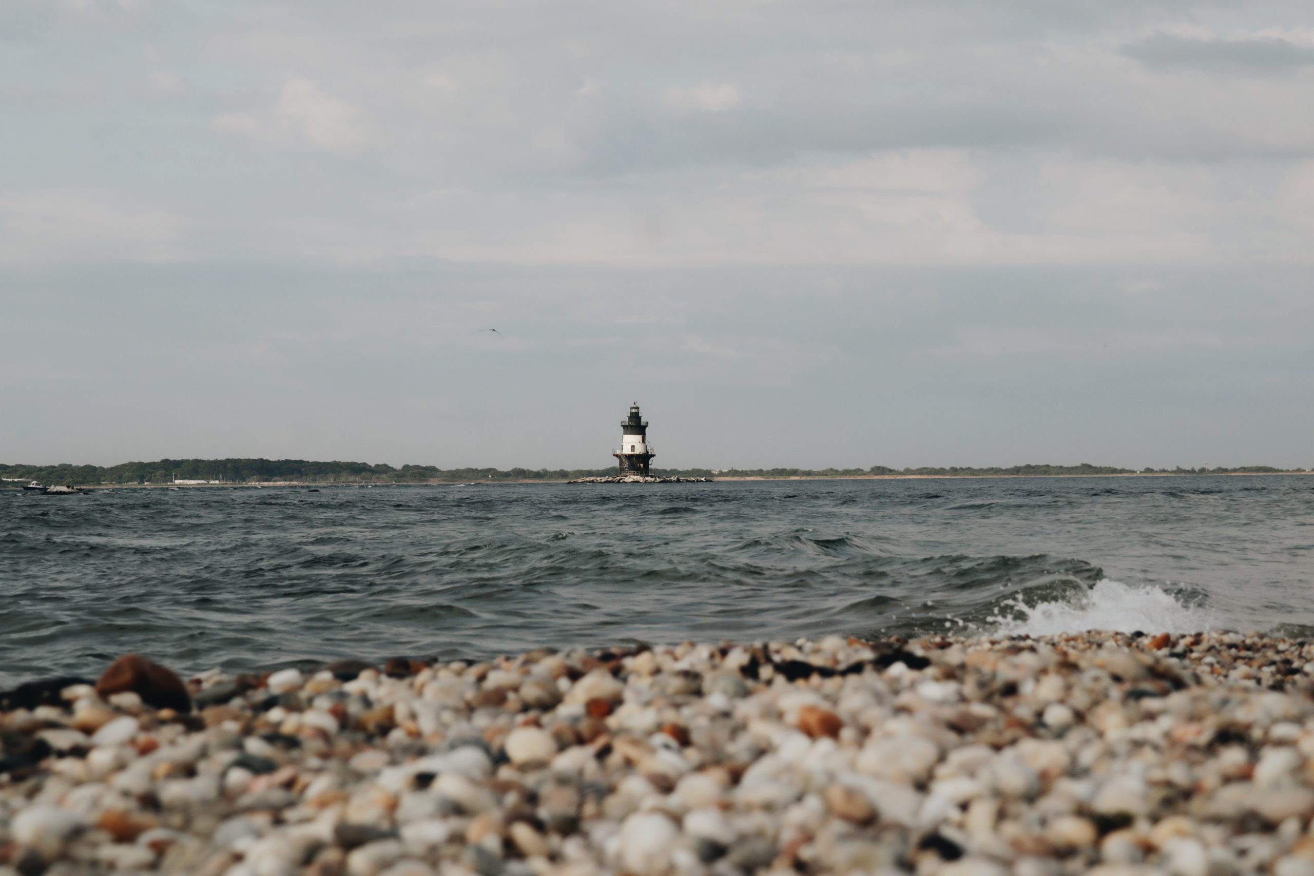North Atlantic Lighthouse seen from a rocky shoreline