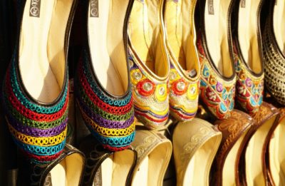collection of colorful, flat shoes