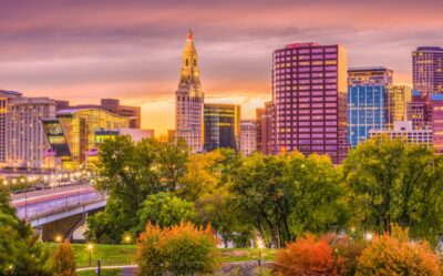 A fall sunset skyline of a CT city