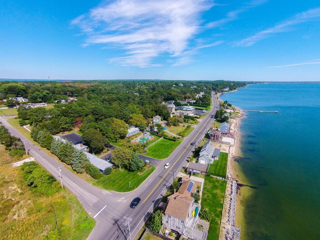 Aerial view of Shinnecock Bay, the Ocean View Terrace Inn, and Edgwater Grill.